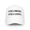 "STILL BROKE. STILL GOING." Hat